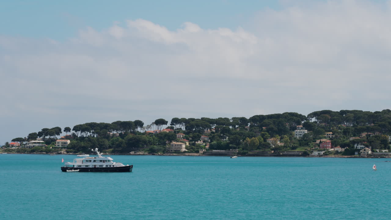 Two ships moving on the Mediterranean sea in daylight