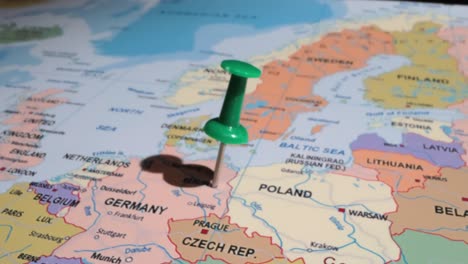 germany - travel concept with green pushpin on the world map. the location point on the map points to berlin, the capital of the german.