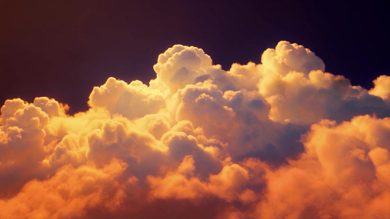Golden Sunset Clouds Glowing Against Dark Sky