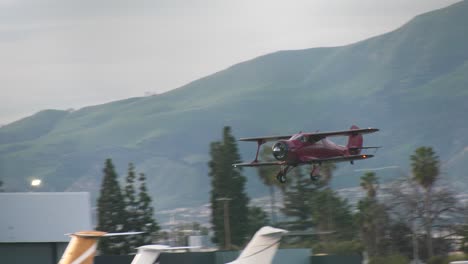 Vintage-Airplane-landing-on-runway