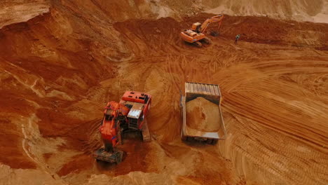 aerial view of mining machinery working at sand quarry. mining equipment