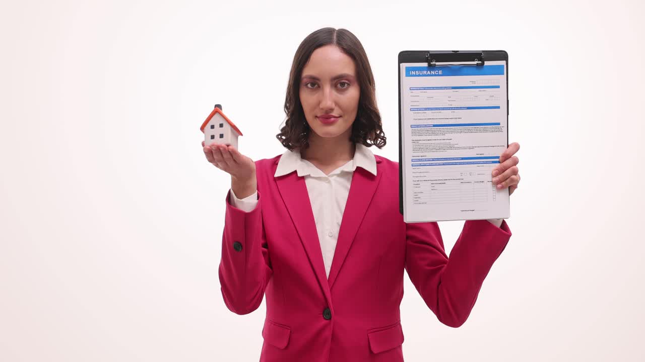 Woman Holding Miniature House and Insurance Documents