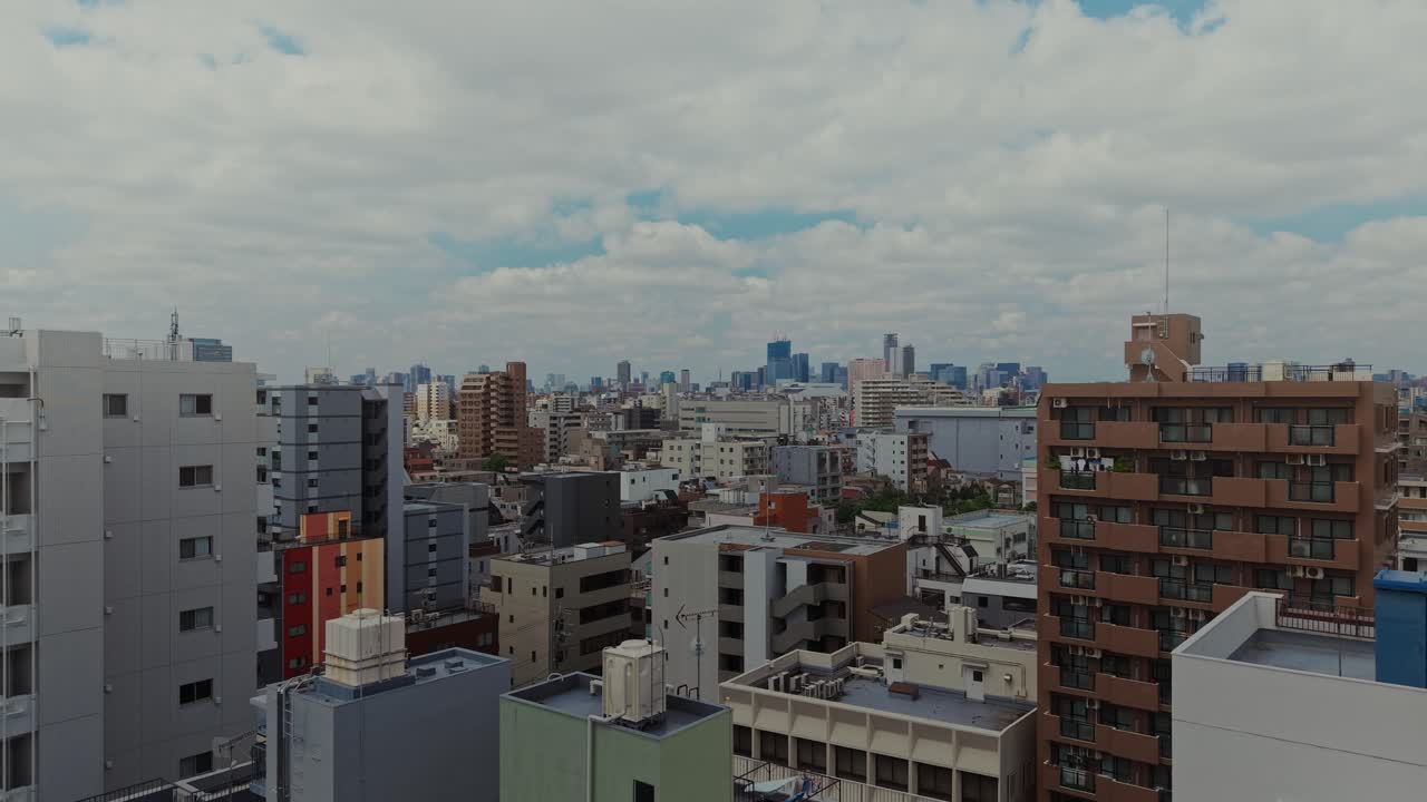 Cityscape with Buildings and Clouds
