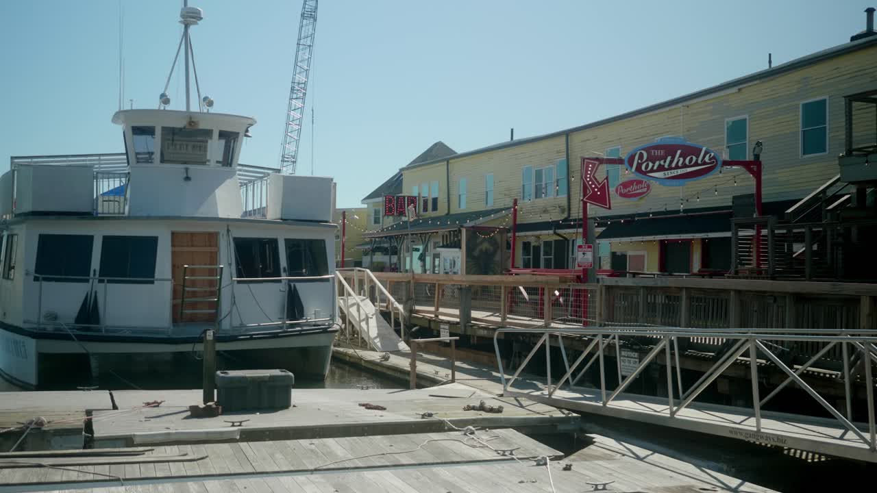 Exploring Old Port with a view of Porthole Restaurant and Pub