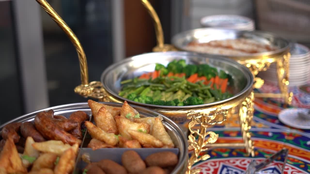 View of food in open buffet, close up shot, high angle shot