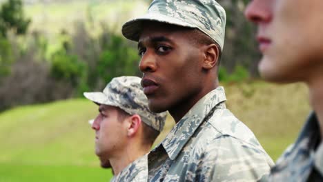 group of military soldiers standing in line 4k