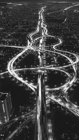 nighttime aerial view of highway interchange