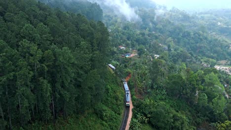 experience the mysterious allure of ella on a foggy day with this stunning aerial drone footage.