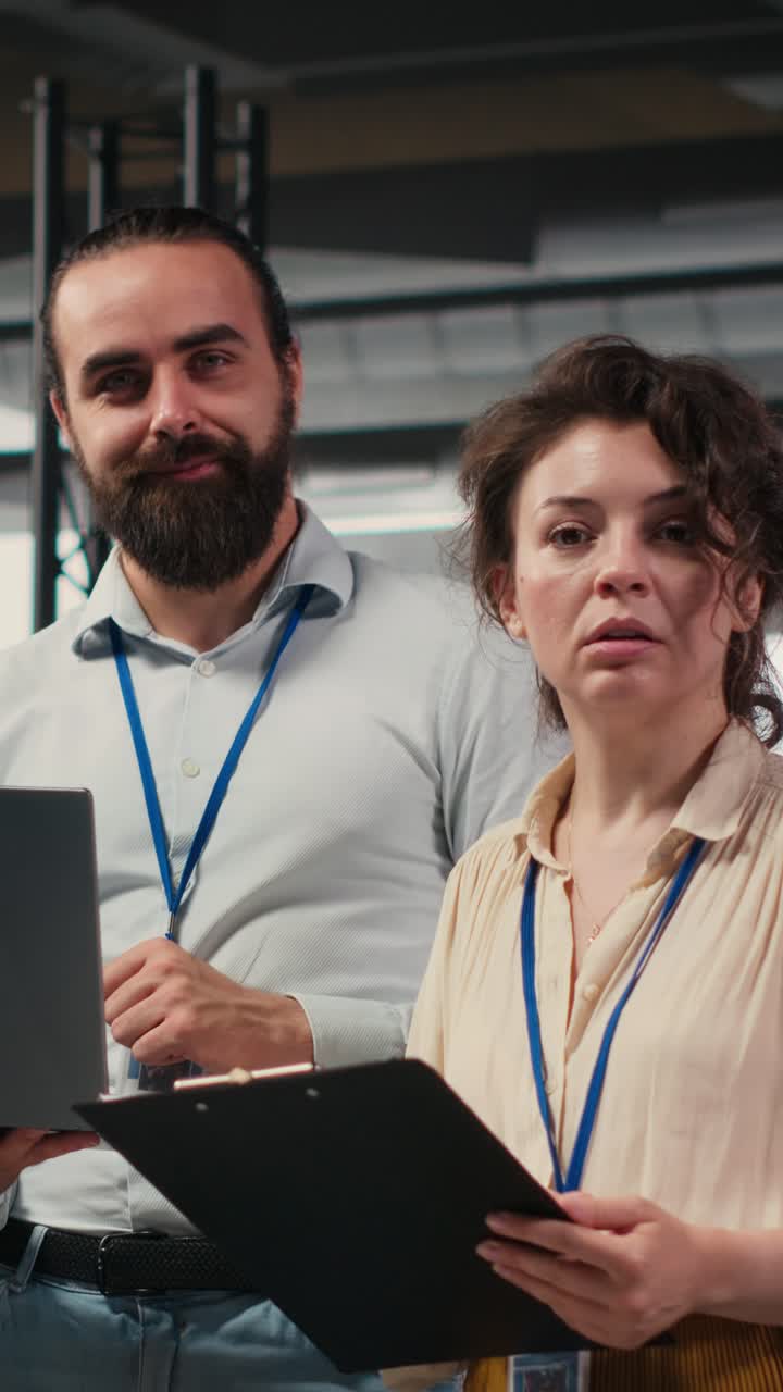 Vertical Video Team of office workers collaborating on project planning and briefing