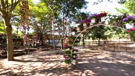 decorative archway in a sunny park setting