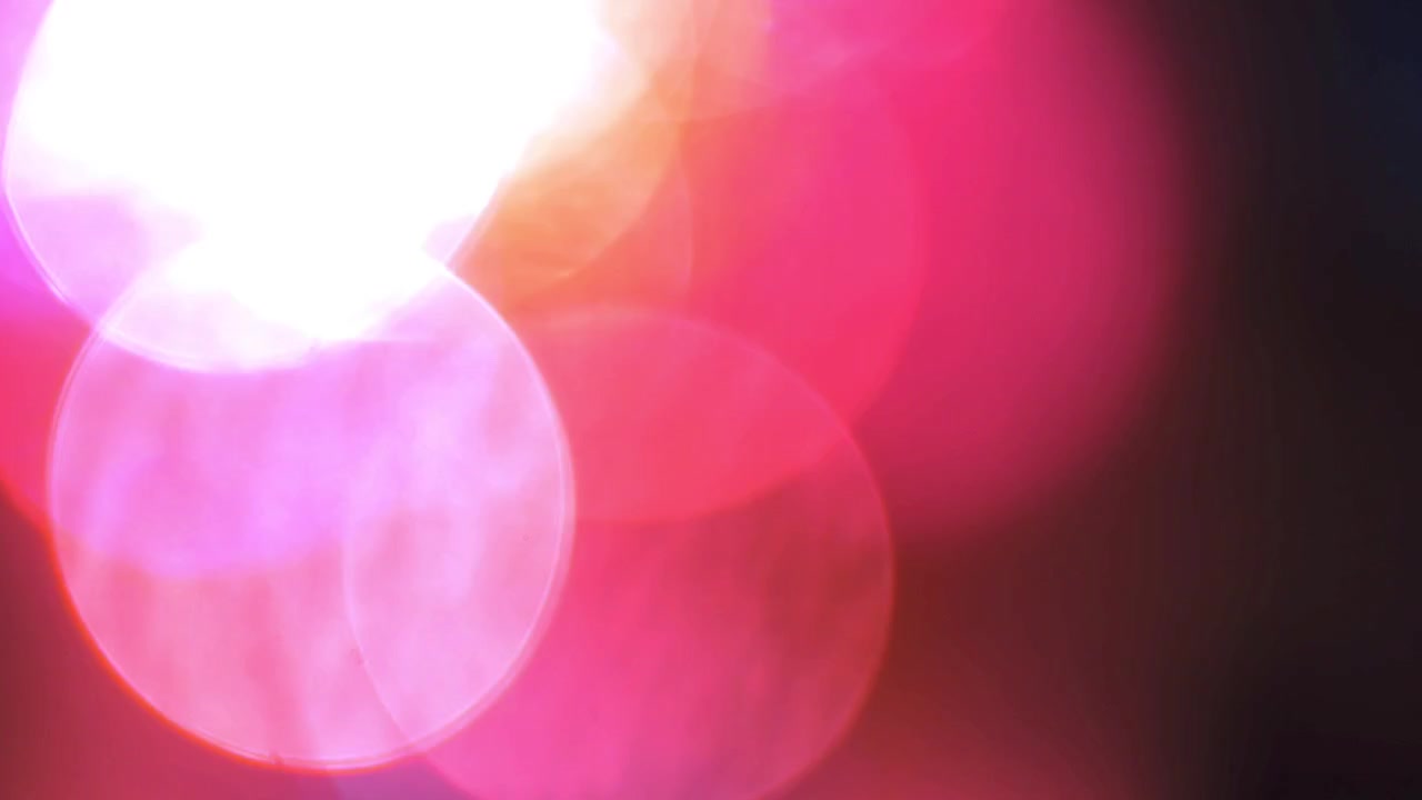 Fughe di luce rosse e viola astratte e sovrapposizione bokeh