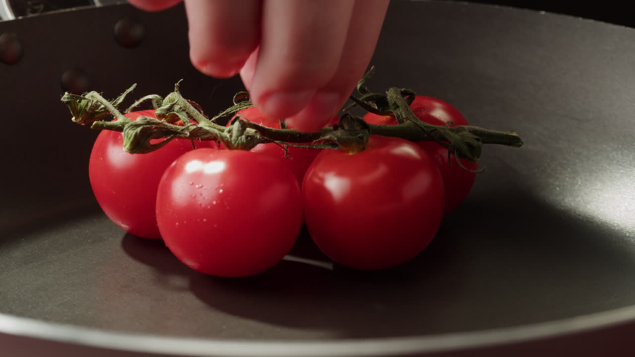 Preparing Cherry Tomatoes in a Pan