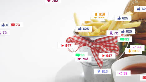 fries in bucket with animation of social media notifications surrounding them