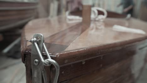 Varnished-boat-bow-boatyard