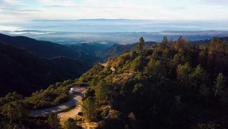 Cyclist-speeds-down-curvy-Mountain-Road-above-Santa-Barbara-at-Dawn