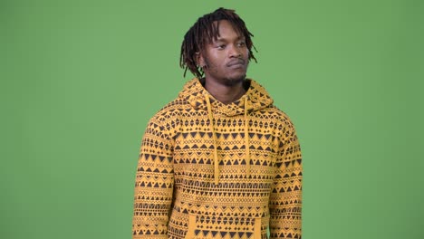 young handsome african man looking bored
