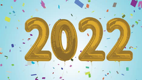animación de números de globos dorados de 2022 y confeti sobre fondo azul