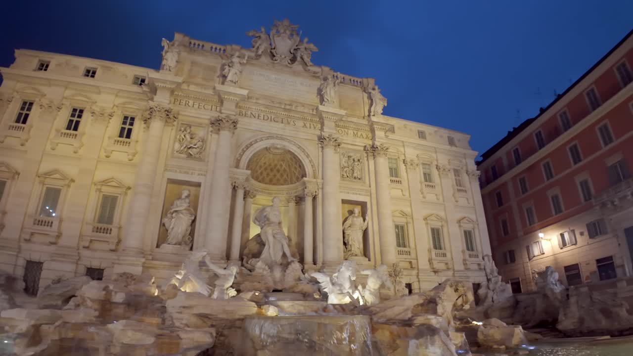 The Trevi Fountain or Fontana di Trevi in Rome, Italy in early morning or twilight