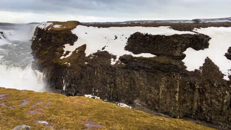 gullfoss waterfall in iceland in a panning establishing shot