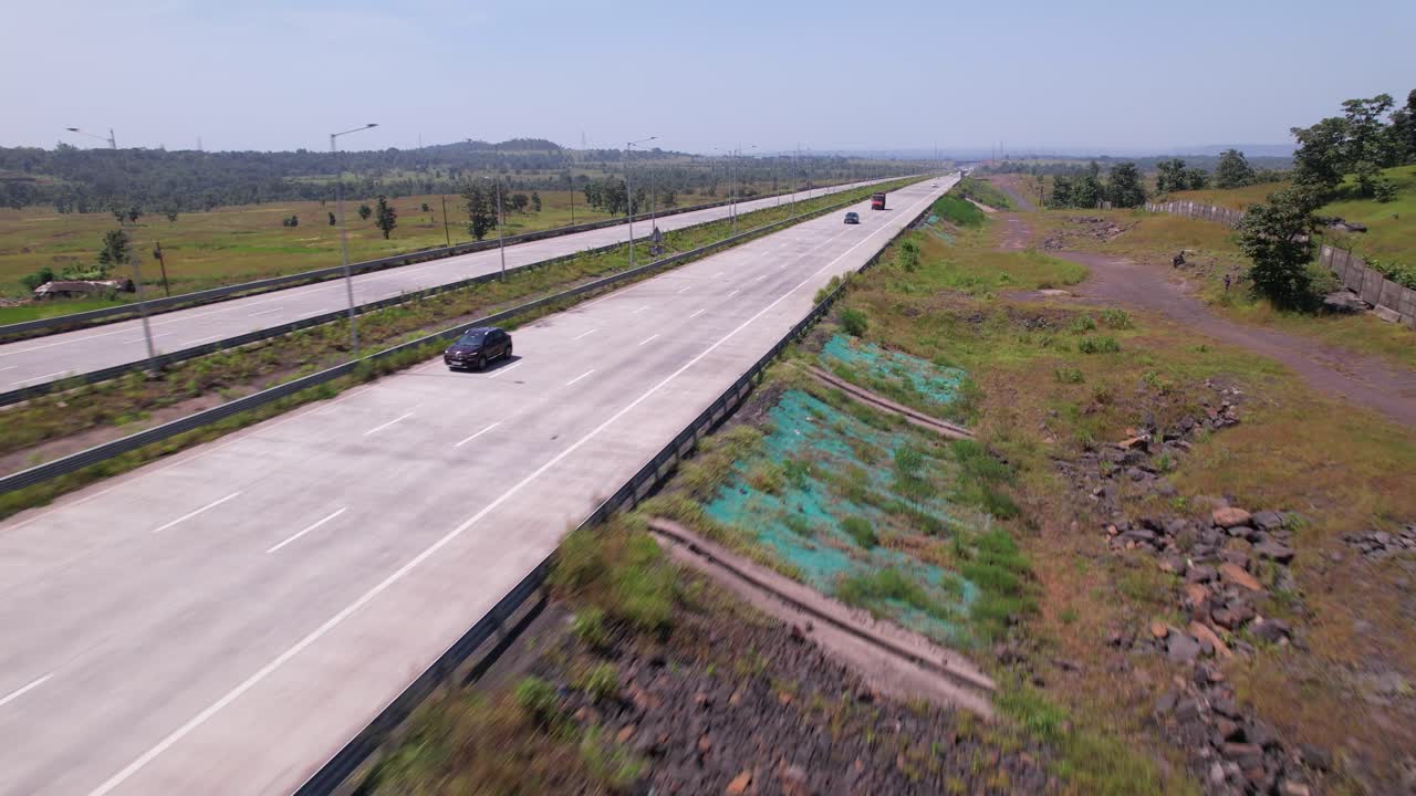 Car is speeding on Samruddhi Mahamarg, Mumbai Nagpur Expressway, Maharashtra, Drone