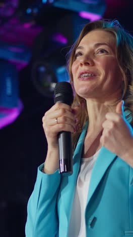 woman public speaking at event