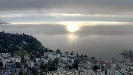 Drone-Aerial-of-the-beautiful-swiss-city-center-of-lausanne-located-on-the-lake-geneva-in-Switzerland-during-winter,-Europe