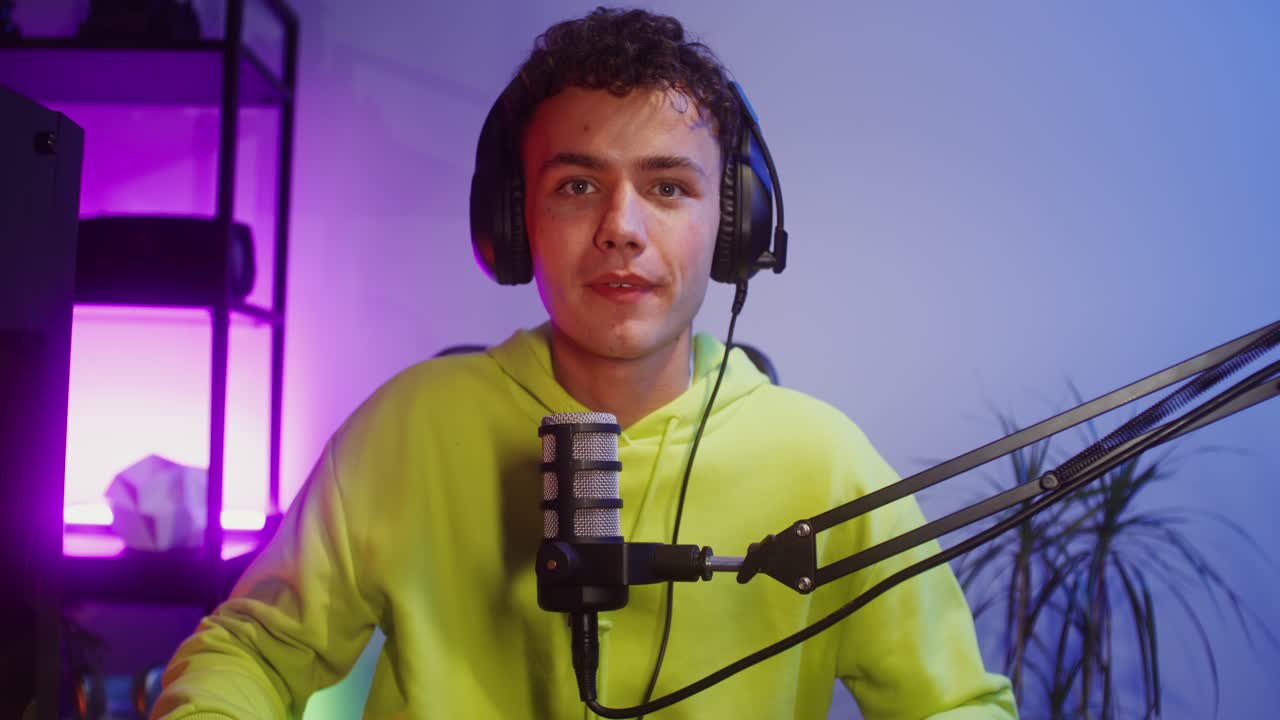 Man with headphones and microphone streaming online