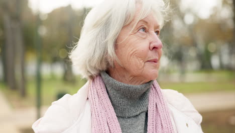 Senior-woman,-thinking-in-park