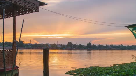 sunset timelapse at nageen lake with houseboats in view, dynamic zoom ease, srinagar, kashmir