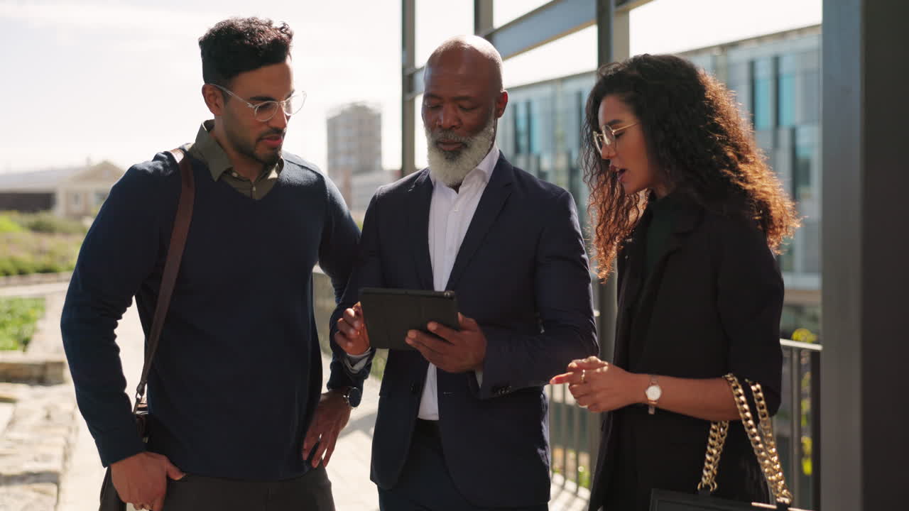Outdoor, business people and leader with a tablet