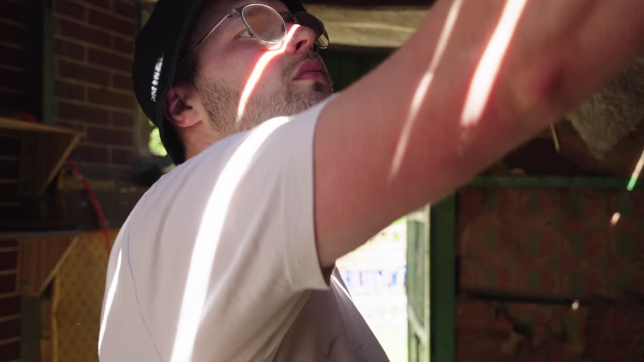 Garden house inside view, taking down the wall covers face close up