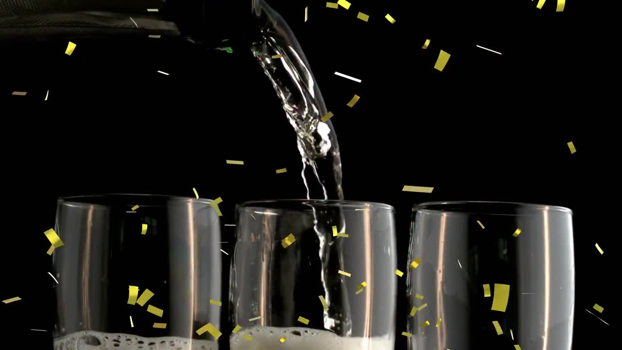 animación de confeti de oro cayendo sobre vasos de champán