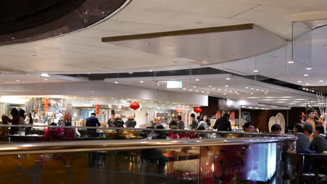 motion of people eating food with family inside restaurant with 4k resolution.