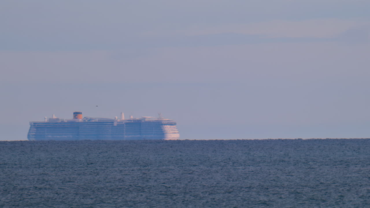 Blurred view of a ship moving on the sea