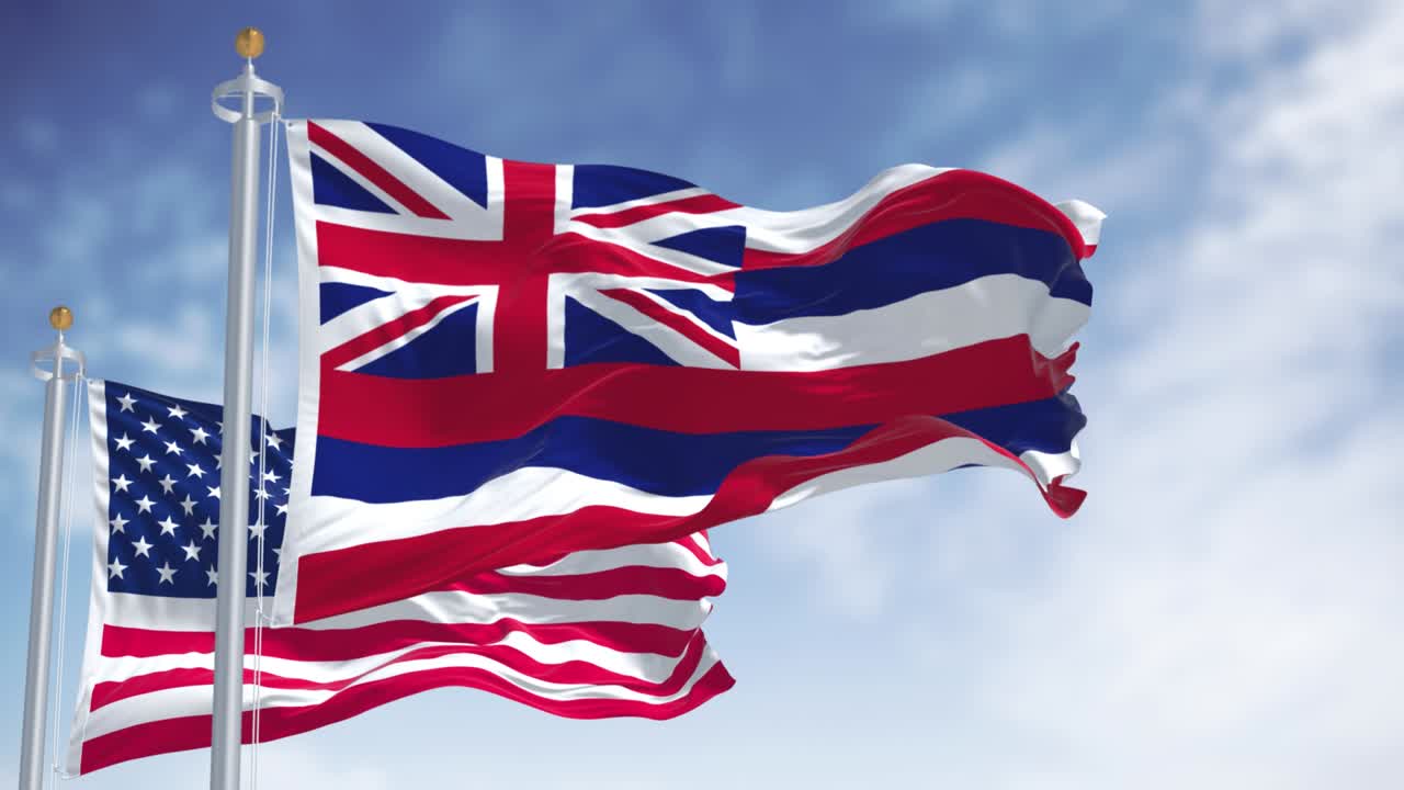 하와이 주의 발이 미국 국기와 함께 흔들리고 있습니다.