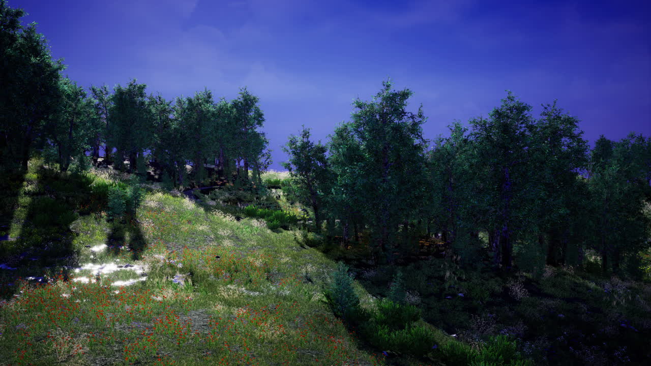Lush green hillside under a clear blue sky with trees and wildflowers