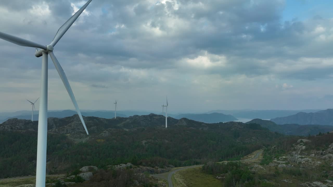 Drone captures vast wind farm producing eco-friendly electricity in Norway.