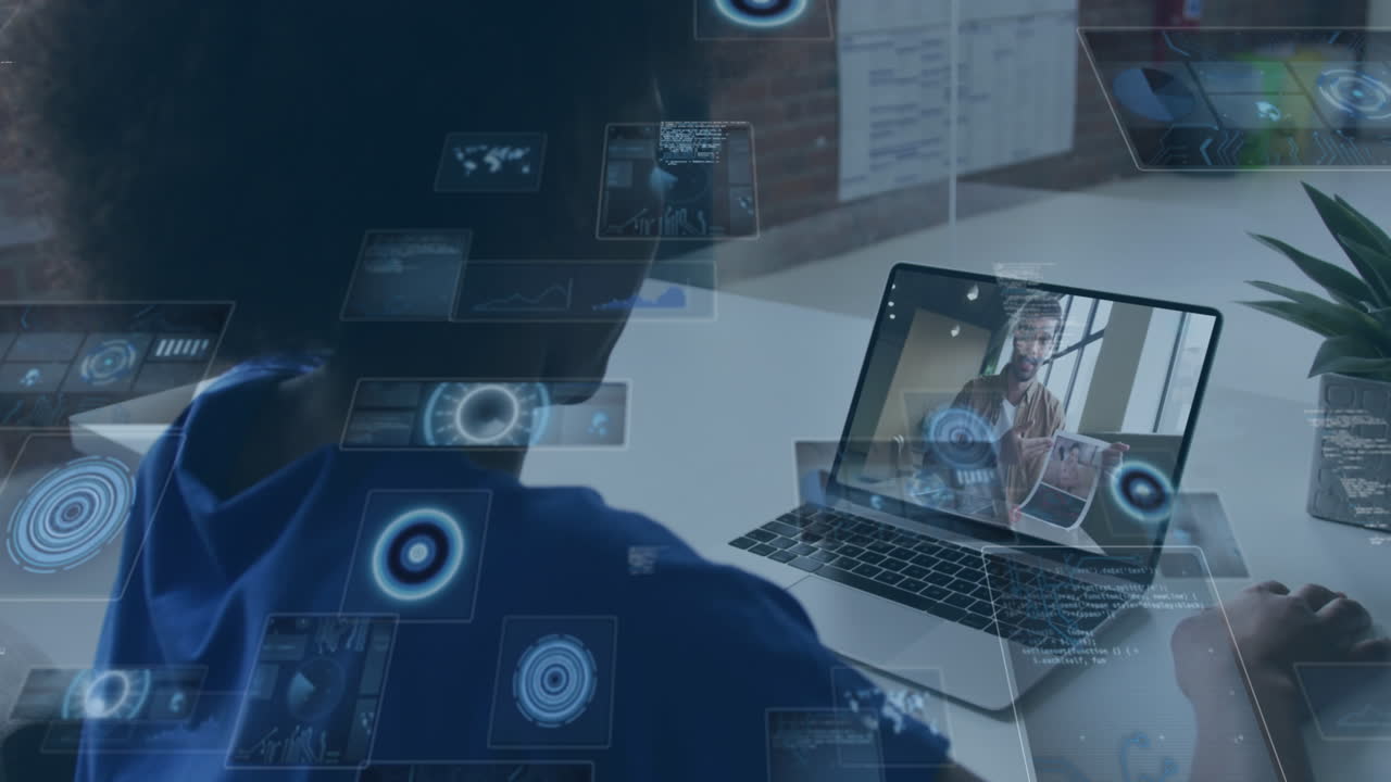 animation von runden scannern über afroamerikanischer frau, die einen videoanruf auf einem laptop im büro hat.