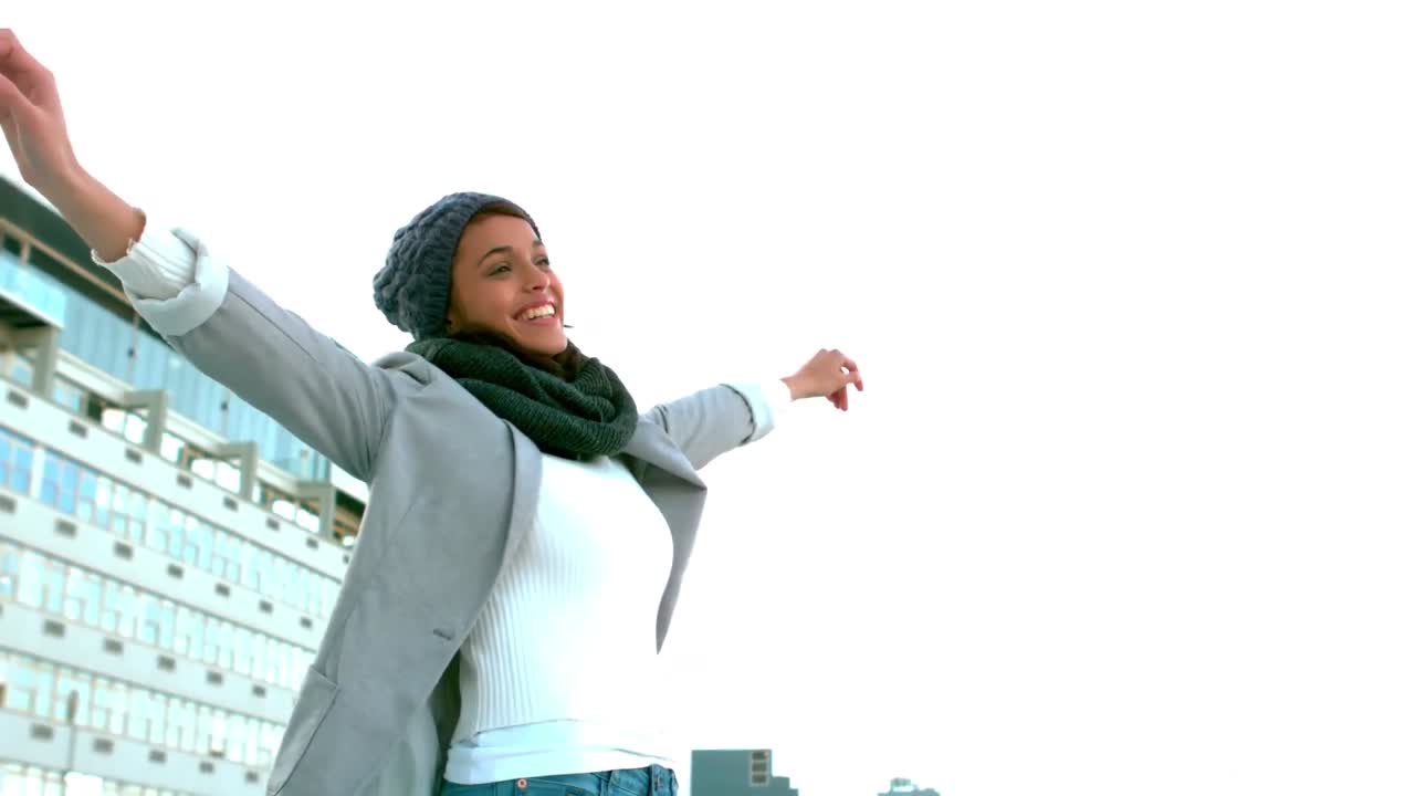 Hipster stretching her arms out