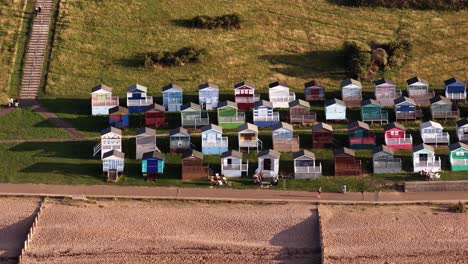 colorful beach huts on whitstable beach, kent, evoke a peaceful vibe