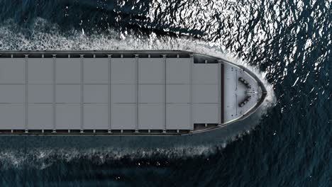 aerial view of a cargo ship sailing through the ocean