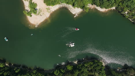 overhead view of boats floating in hogscald hollow ravine in beaver lake, arkansas, usa