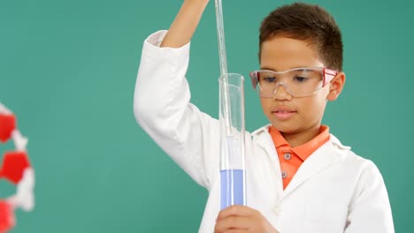 schoolboy doing a chemical experiment in laboratory 4k