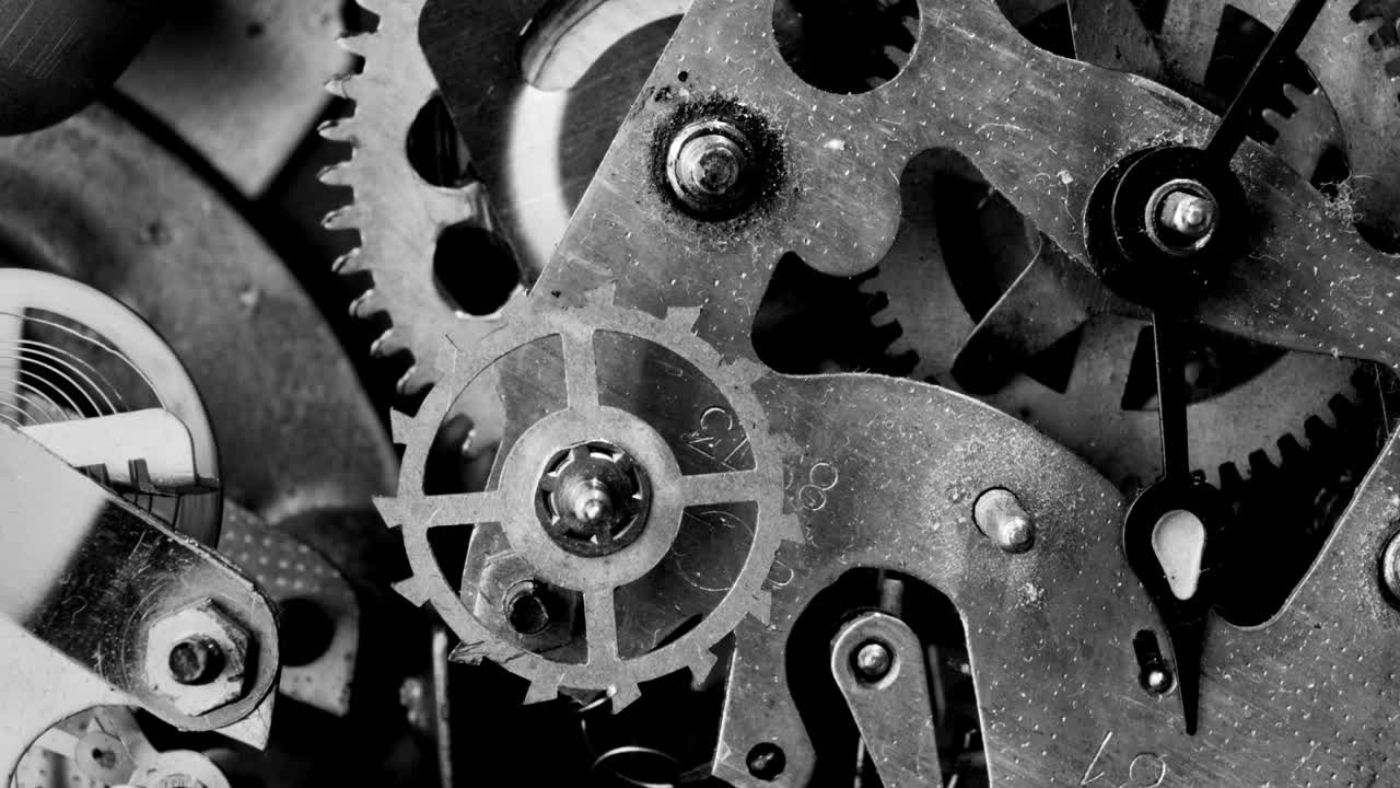 Watch mechanism macro loop. Old vintage clock mechanism working.