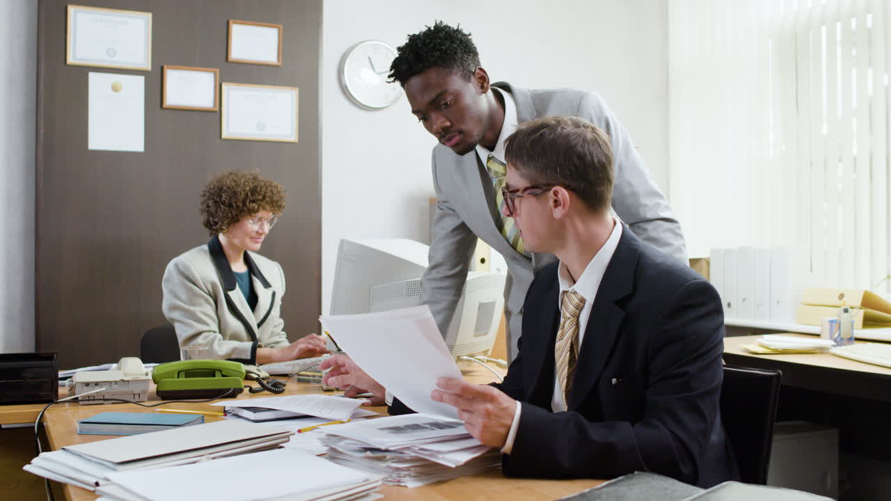 Businesswoman using retro computer in vintage office.