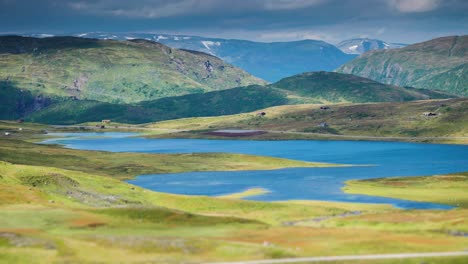 A-timelapse-video-of-heavy-clouds-rushing-above-the-high-altitude-plateau,-casting-dark-shadows