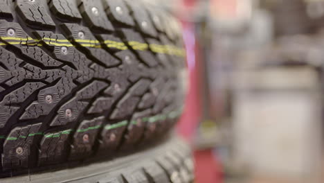 Brand-new-studded-winter-tyres-ready-for-snowy-icy-conditions