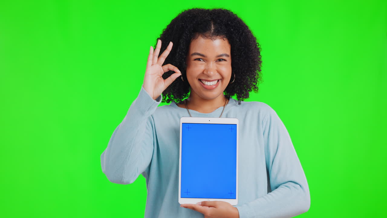 Woman, okay sign and tablet with mockup on green