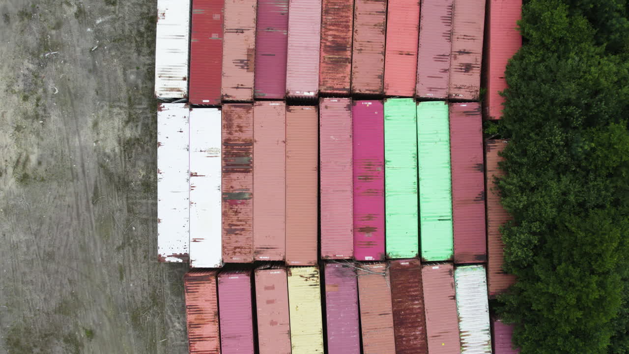 Bird's eye view drone shot of containers in Hafrestroms Foretagspark during the day, industry in Asensbruk, Dalsland, Sweden