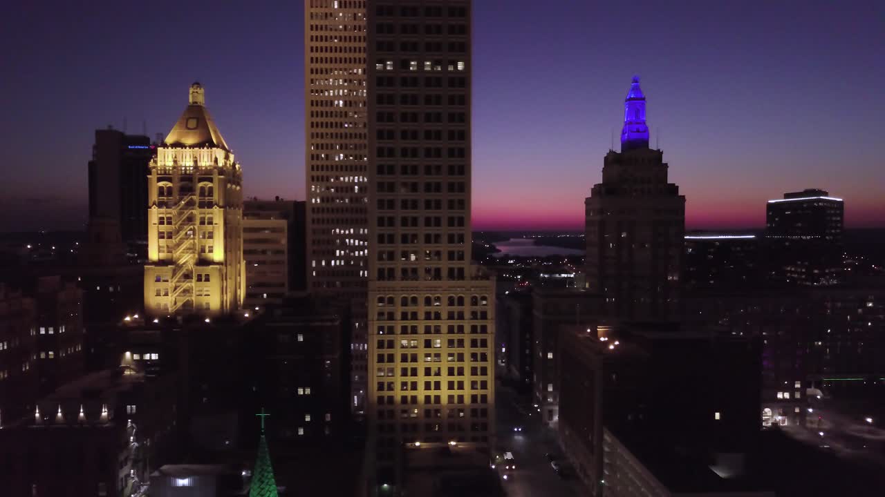 Tulsa skyline and Arkansas River at sunset flyby drone.